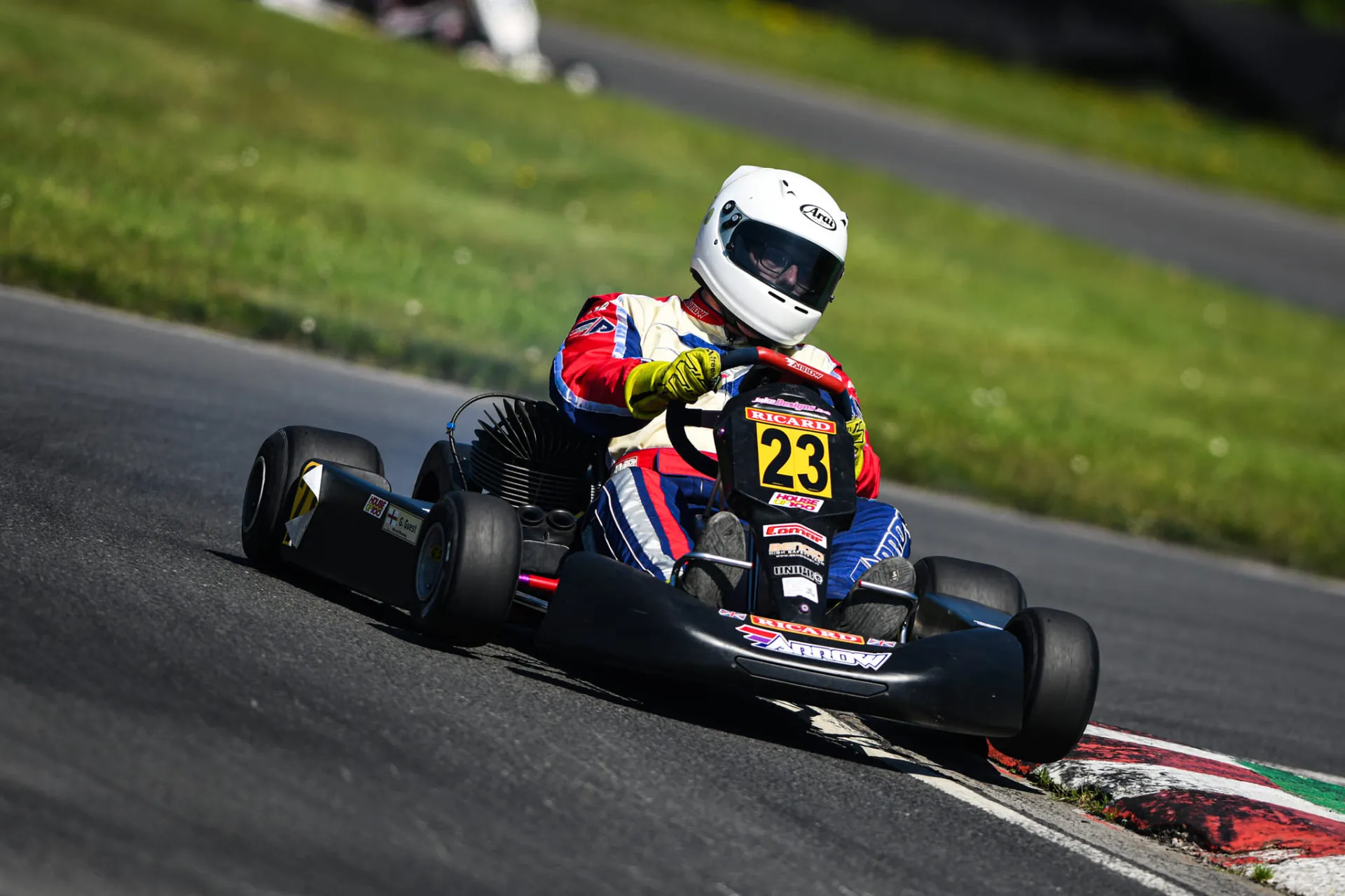 Glenn Guest cornering in the #23 100cc kart